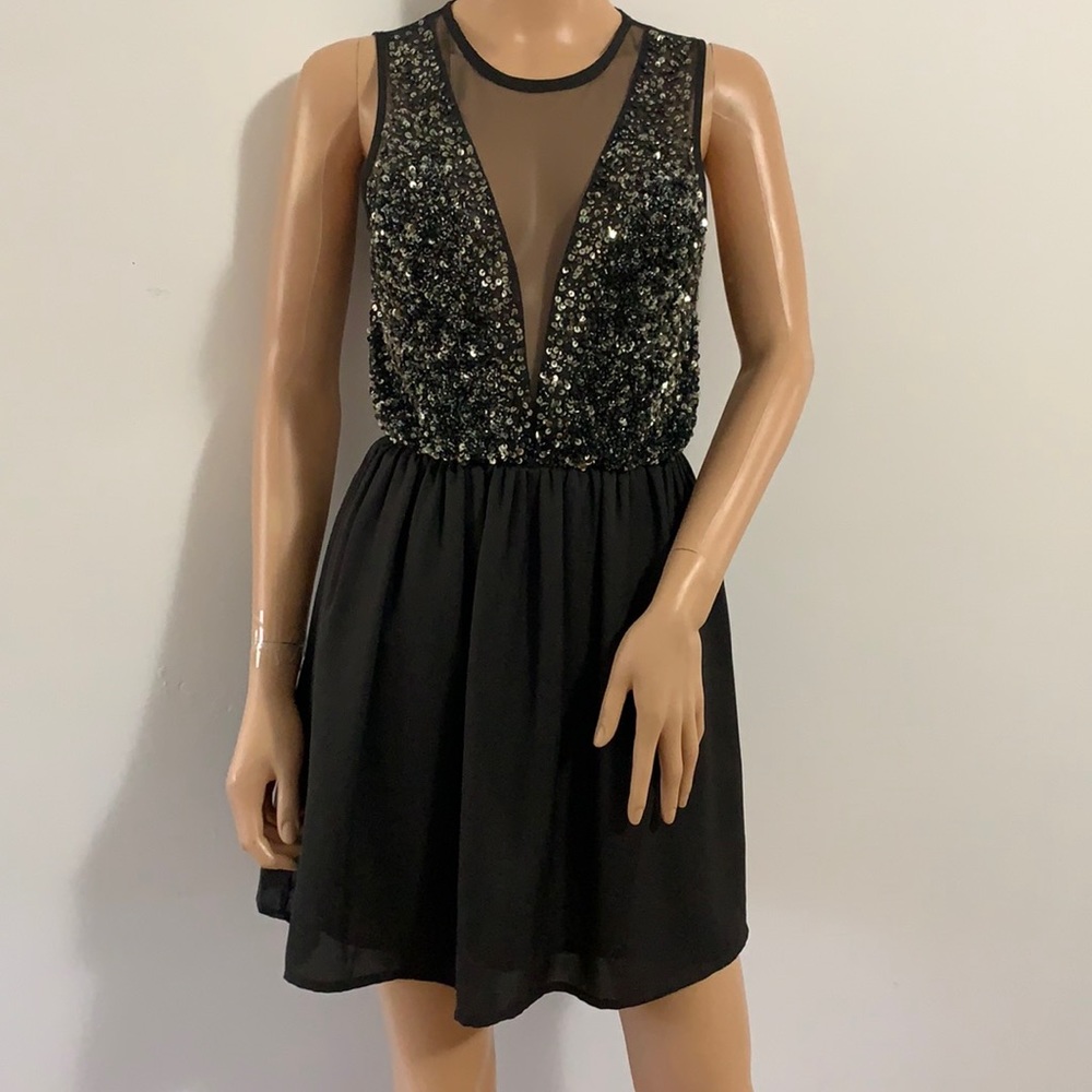 Forever 21 Woman’s Black Dress.